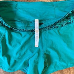 Turquoise green Lululemon shorts 4 in size 8